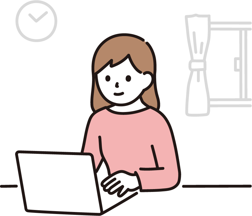 机でパソコンを操作している女性